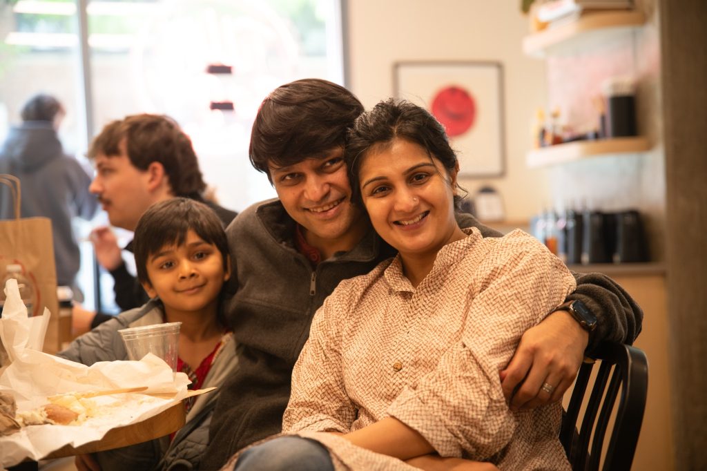 Shikha and her family wrap their breakfast and prep to head back to finish their move. Photographed by Finn Martin/BruinLife.