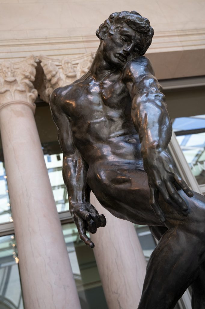 Auguste Rodin's depiction of Adam. His right index points at the earth to reveal his fall from Eden. Photographed by Finn Martin/BruinLife.