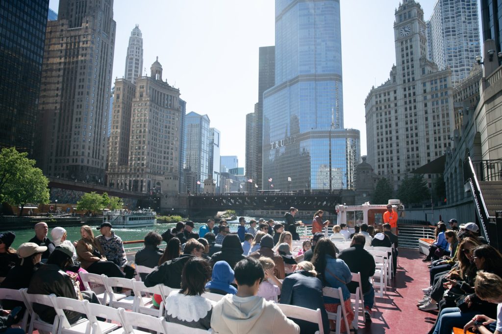 Riders load in on the top deck of the river cruise. The two decker ship begins its tour between the Michigan and Columbus bridges. Photographed by Finn Martin/BruinLife.