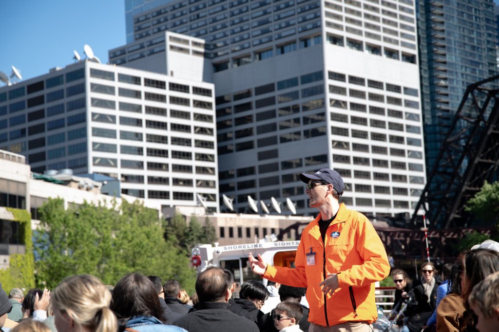 Josh, our guide, got his start on Chicago's Broadway in the theatre before transitioning to the river tour business. Photographed by Finn Martin/BruinLife.