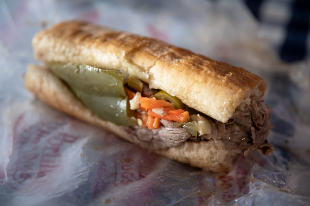 The dipped Italian Beef Sandwich, nicely packed and peppered. Photographed by Finn Martin/BruinLife.