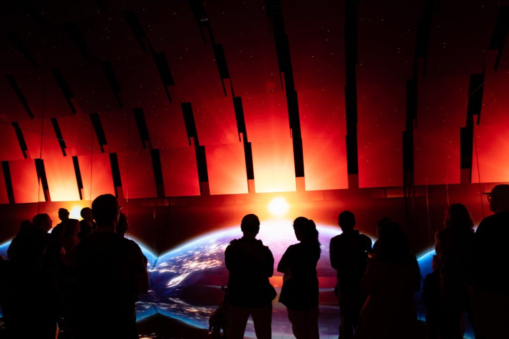 Viewers step into a 360 immersive room where LED paneled visuals display a series of water cycle videos, showing how delicate our planet's water cycle is and the threats posed by micro plastics. Photographed by Finn Martin/BruinLife.