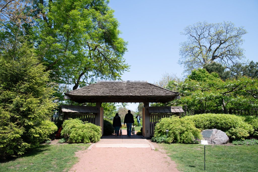 The gate to the Garden of the Phoenix Japanese garden in Jackson Park. The garden was installed as part of the 1893 World's Columbian Exposition. Photographed by Finn Martin/BruinLife.