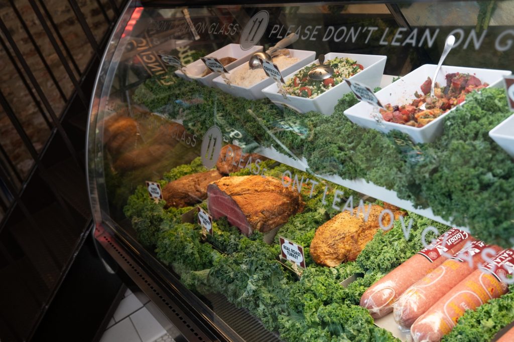 Deli cuts, a stocked bar and easy sandwiches wait for you as you wait in the lobby. Photographed by Finn Martin/BruinLife.
