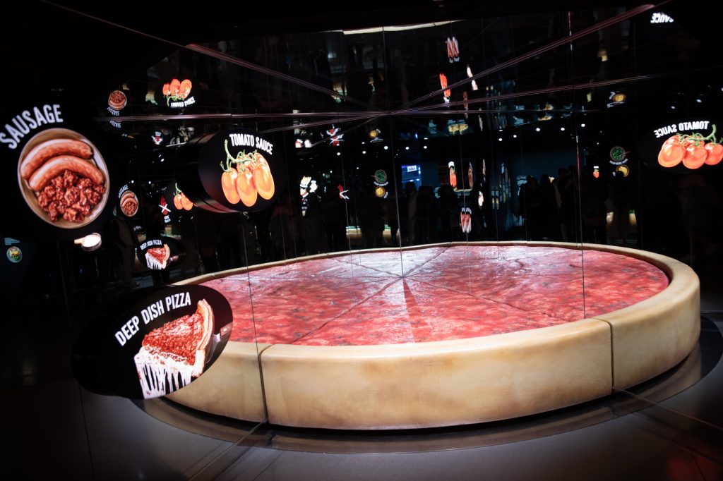 A giant deep-dish pizza welcomes you to the Skydeck. Photographed by Finn Martin/BruinLife.