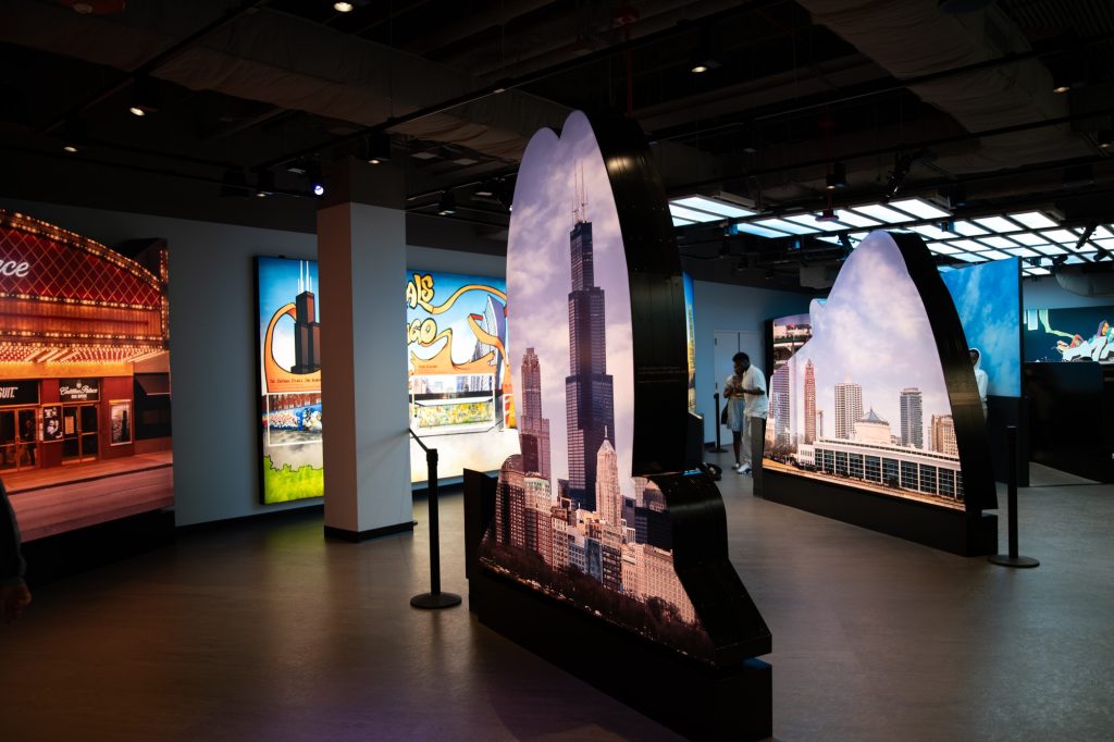 The interior of Willis Tower houses a billboard with iconic views of the city. Photographed by Finn Martin/BruinLife.