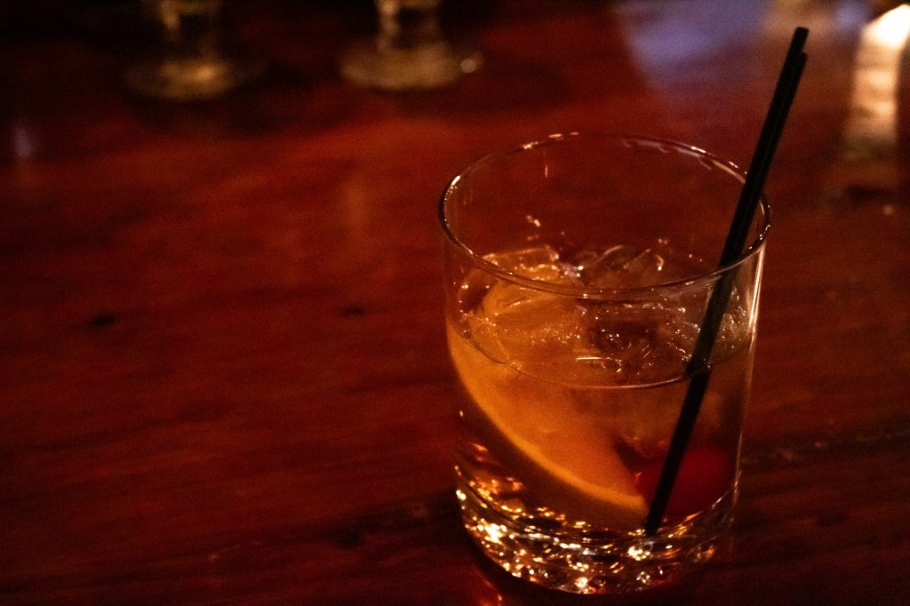 Smooth and balanced between sweet and bitter, the Old Fashioned on the rocks is a delight to savor. This classic cocktail came amidst an offering of less traditional drinks like THC blends and specialty mules. Photographed by Finn Martin/BruinLife.