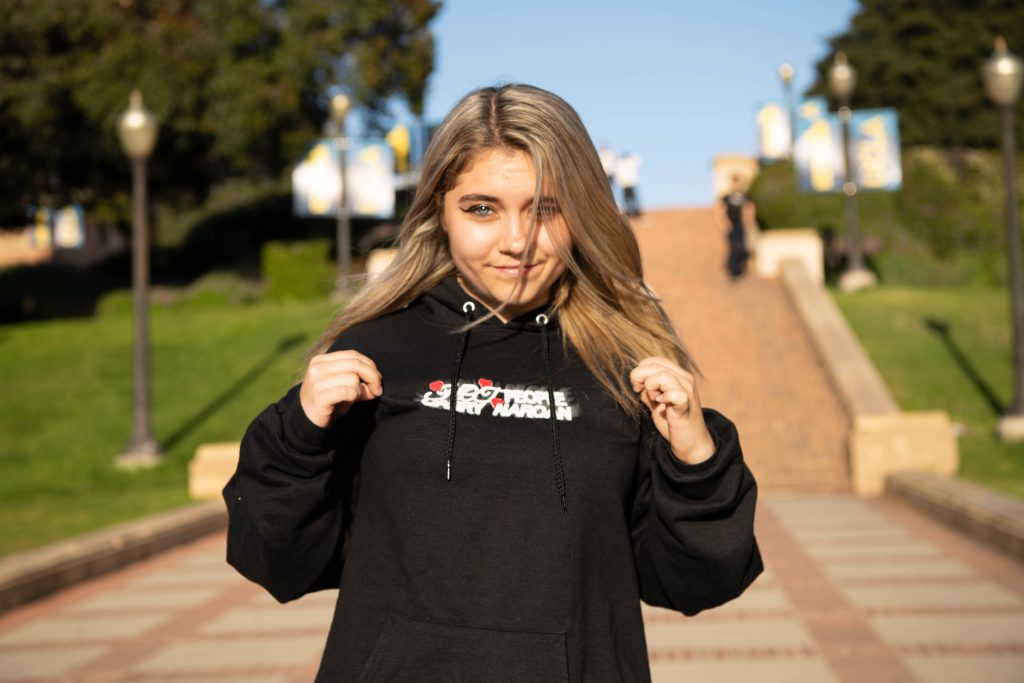 Cayla Younger, 2nd year physiological science student and media coordinator at End Overdose UCLA poses for a picture at Janss Steps. Photographed by Khaled Al Duwaikat/BruinLife.