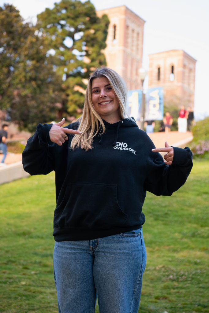 Kenan Thomas, 3rd year global studies and cognitive science major and fundraising events coordinator at End Overdose UCLA poses for a picture at Janss Steps. Photographed by Khaled Al Duwaikat/BruinLife.