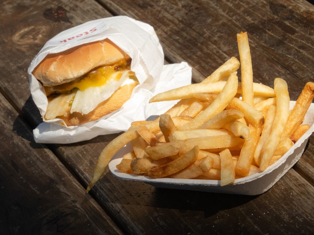 Perfect for a plunge, The Apple Pan serves a stocky set of fries that are just right for scooping ketchup and mustard. Paired with the Steakburger, lunch became an American affair. Photographed by Finn Martin/BruinLife.