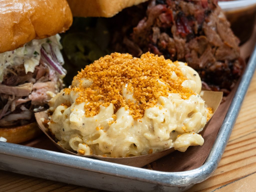 The panko-sprinkled Mac and Cheese offers a light and creamy side to balance out the heaviness of the main course meats. Photographed by Finn Martin/BruinLife.