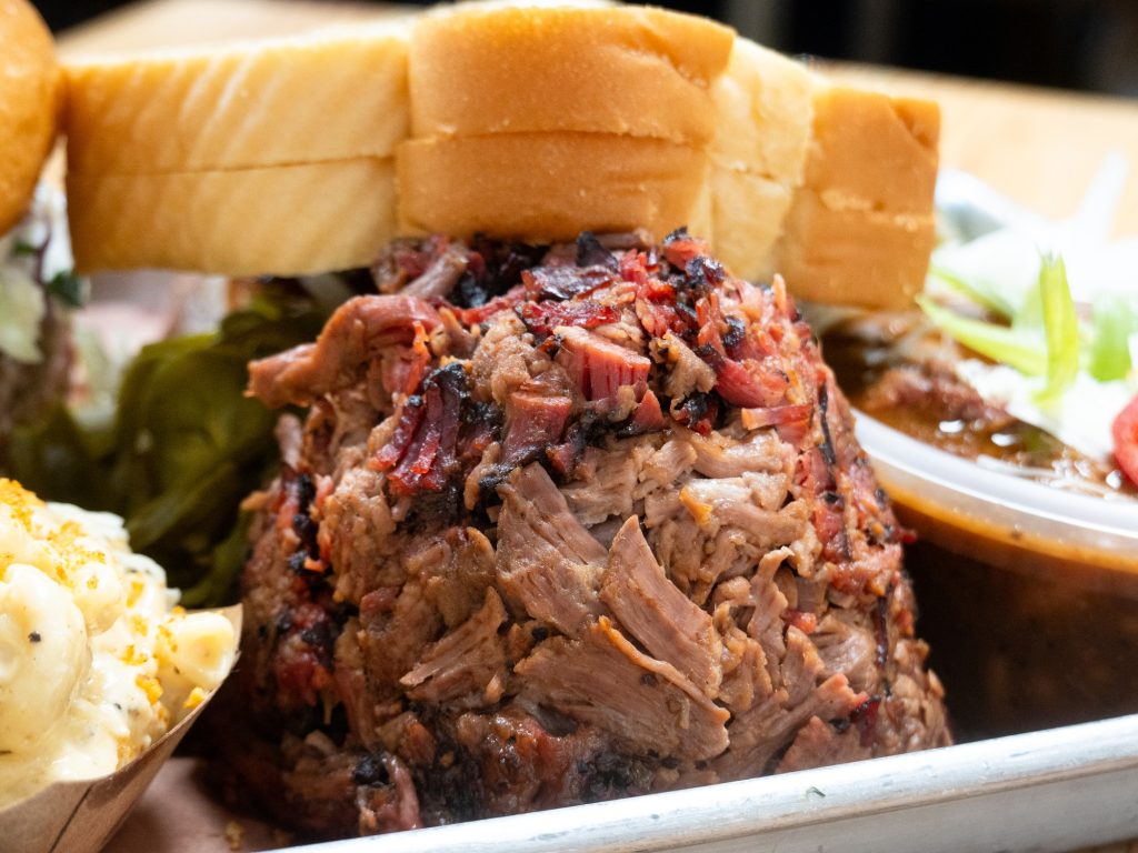 The chopped brisket comes in the shape of a citadel: a drier outer shell baked with burnt ends and a peppery feel that surround the softer inside. Photographed by Finn Martin/BruinLife.