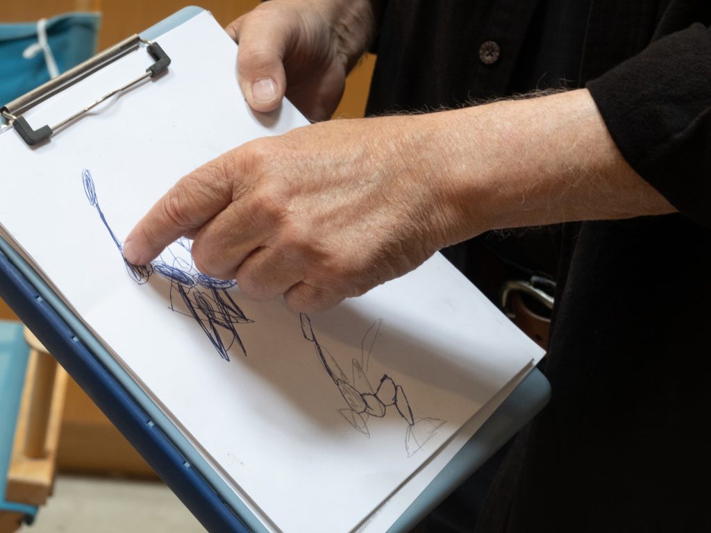 Woods Davy walks us through his drafting and design process for his signature stone sculptures. Photographed by Finn Martin/BruinLife.